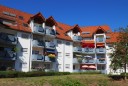 Attraktive Maisonette-Wohnung mit Balkon, Gäste WC und Tiefgaragenstellplatz