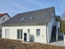 Exklusives Investment: Modernes 3-Familienhaus mit nachhaltiger Energieeffizienz